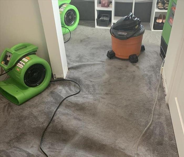 Water damage to carpet with dryers
