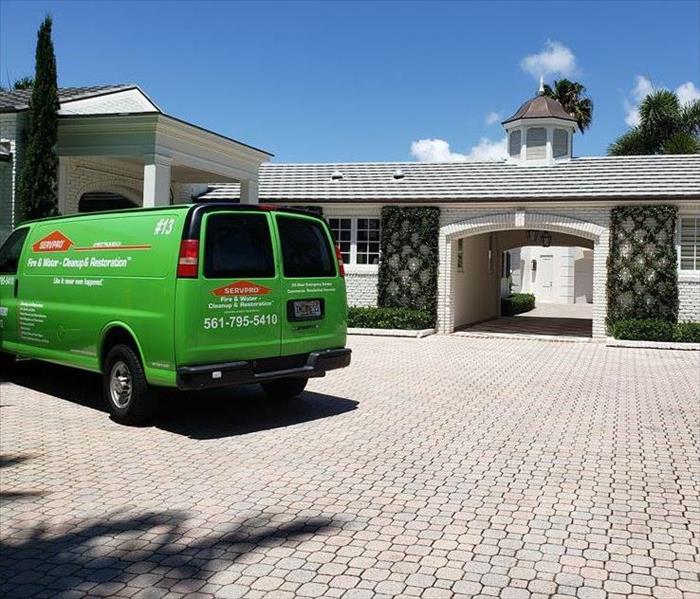 SERVPRO green van outside of West Palm Beach home